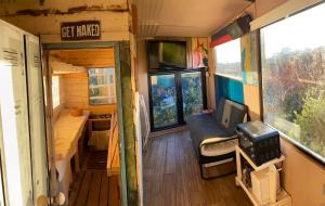 an inside view of a tiny house with a living room at Two Top Central Unique Artisan Beach Studios - also separate spa cabin in Brighton & Hove