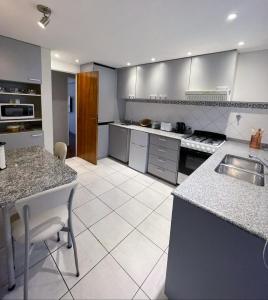 Kuchyň nebo kuchyňský kout v ubytování Mendoza Your Apart + 38 fotografií