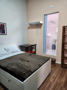 Postel nebo postele na pokoji v ubytování Fujima Hostel