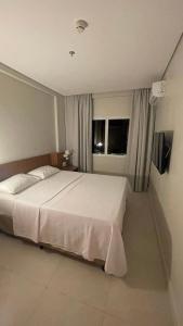 Un ou plusieurs lits dans un hébergement de l'établissement Salinas Exclusive Resort 1308