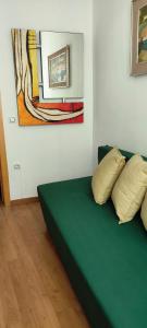 Een bed of bedden in een kamer bij La Casita del Arte
