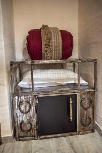 a shelf with two pillows on top at El Campo in Sierra de la Ventana