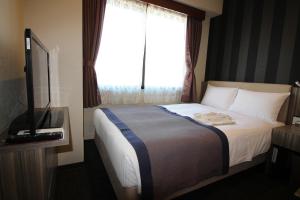 Cama o camas de una habitación en Almont Inn Tokyo Nihonbashi