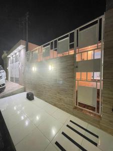 a view of a building at night at Napolitan House in Manaus