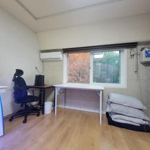 a room with a white desk and a window at Seoul venture town stn #2 7mins, near forest room in Seoul