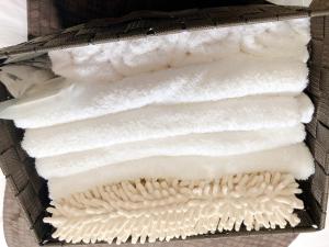 a basket full of white paper towels sitting next to each other at I・ecoⅢ（アイエコスリー） in Niigata