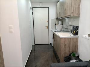 A kitchen or kitchenette at Central Bachelor