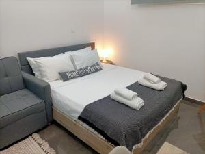 A bed or beds in a room at Central Bachelor