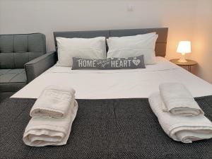 A bed or beds in a room at Central Bachelor