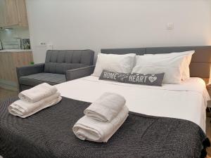 A bed or beds in a room at Central Bachelor