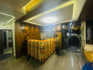 Lobby o reception area sa Hotel Royal Inn Lodge Dharwad