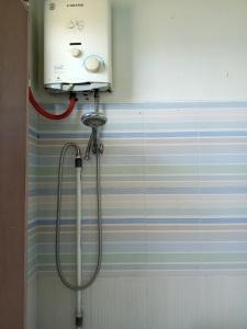 Ванная комната в OYO 93012 Griya Kencana Asri Syariah