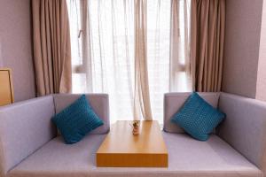 Χώρος καθιστικού στο Orange Tree International Hotel Zhujiang New Town Huacheng Sqaure Branch - Free Shuttle Bus to Canton Fair Complex During Canton Fair Period