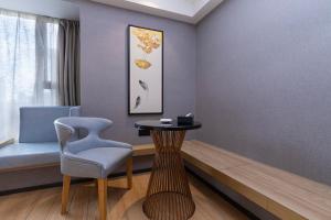 Χώρος καθιστικού στο Orange Tree International Hotel Zhujiang New Town Huacheng Sqaure Branch - Free Shuttle Bus to Canton Fair Complex During Canton Fair Period