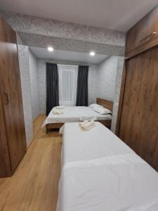 Postel nebo postele na pokoji v ubytování Two bedrooms apartment "Kitesa"