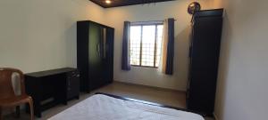 Soly's Villa Homestay客房内的一张或多张床位