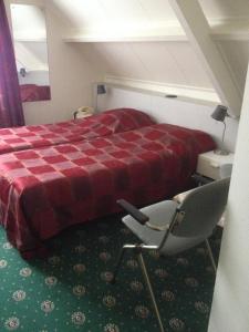 Katil atau katil-katil dalam bilik di De Spaarbankhoeve