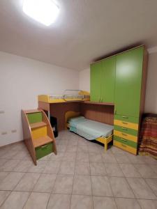 Postel nebo postele na pokoji v ubytování Sorso, 18km di spiagge low-cost