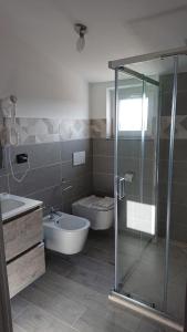 Kúpeľňa v ubytovaní Hotel Ogliastra
