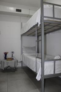 Letto o letti in una camera di Hostel Near The Square
