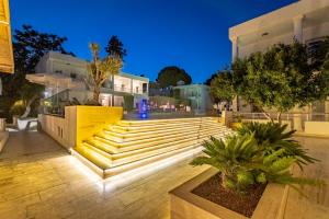 a set of stairs in front of a building at night at Costa Maya Bodrum in Bodrum City