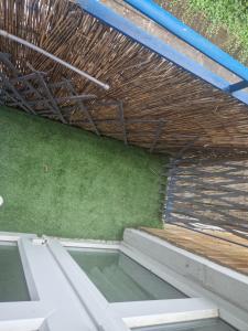 a pool of water in the middle of a patio at Immaculate 1-Bed Apartment in Woodford Green in Woodford Green