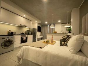 Kuchyň nebo kuchyňský kout v ubytování Luxury Beach Getaway@Coral Point