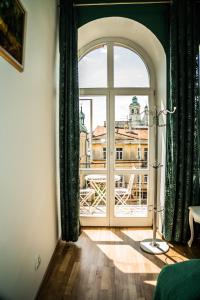 an open window with a view of a building at Hostel Pod Basztą in Lublin