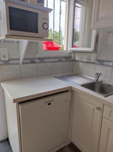 Кухня или мини-кухня в Maison vue sur le bassin, proche du centre ville
 +29 фотографий