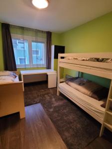 Posteľ alebo postele v izbe v ubytovaní LI-DO Vendégház