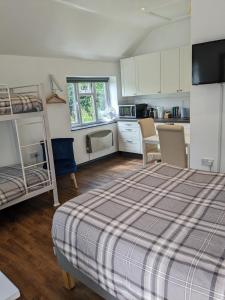 Kuchyň nebo kuchyňský kout v ubytování Featherbed Cottage