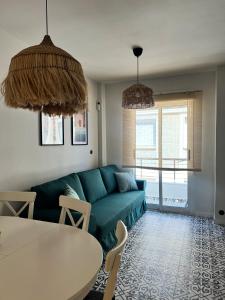Część wypoczynkowa w obiekcie Cozy apartment La Mata