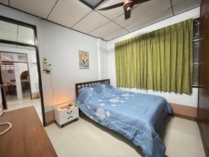 Ένα ή περισσότερα κρεβάτια σε δωμάτιο στο Lotus House