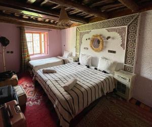 Postel nebo postele na pokoji v ubytování Berber Family Lodge