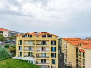 an overhead view of a building with orange roofs at Bela Vista Valley in Calheta