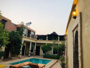 The swimming pool at or close to Riad Rime Garden Marrakech