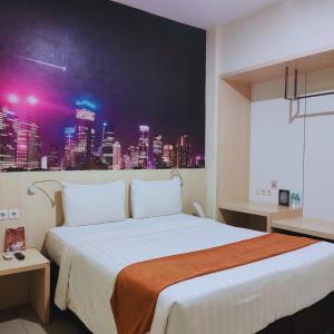Postel nebo postele na pokoji v ubytování D'Bamboo Suites