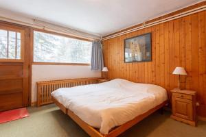 Postel nebo postele na pokoji v ubytování Chalet Robaumont - Grand chalet familial proche du centre et des pistes