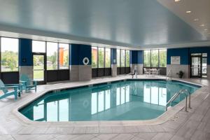 a large swimming pool in a building at Hampton Inn Seekonk in Seekonk