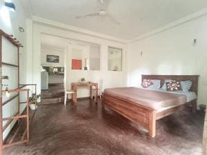 Ένα ή περισσότερα κρεβάτια σε δωμάτιο στο Acmi Villa