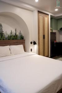 Postel nebo postele na pokoji v ubytování Mecozy Apartel