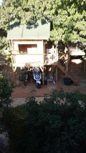an aerial view of a house with two motorcycles parked outside at Lahav Suite in Kefar Daniyyel