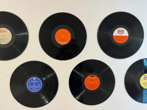 a bunch of vinyl records sitting on a wall at Music Residence in Saarbrücken +20 photos