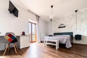 TV a/nebo společenská místnost v ubytování B&B Dimora Belvedere