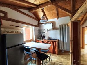 Kuchyň nebo kuchyňský kout v ubytování Resort CuraLibera