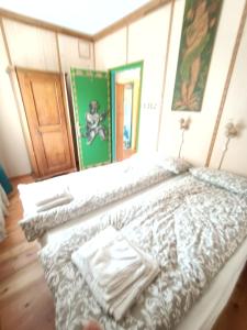 Postel nebo postele na pokoji v ubytování Resort CuraLibera