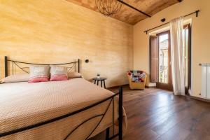 Postel nebo postele na pokoji v ubytování B&B Dimora Belvedere