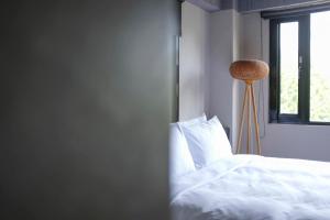 Letto o letti in una camera di 番茄行旅