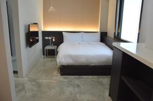 Letto o letti in una camera di 番茄行旅