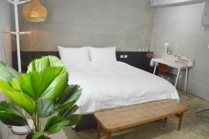 Letto o letti in una camera di 番茄行旅